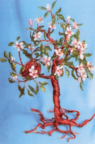 Flowering tree from beads with their hands