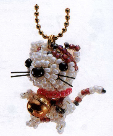 Keychain made of beads in the form of a cat