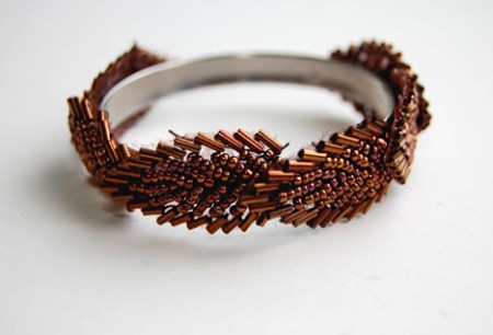 Beaded bracelet on a metal base