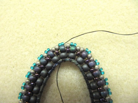 Oval beaded pendant