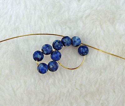 Earrings of round beads