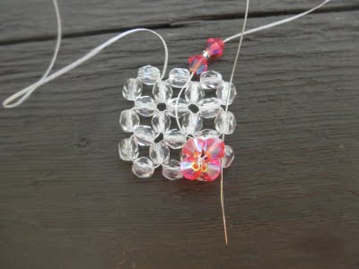 A ring of beads and bicone Swarovski