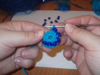 Hook and beads. Knit flower