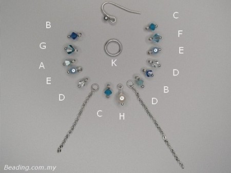 Earrings of blue faceted bicone