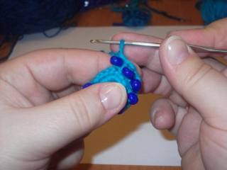 Hook and beads. Knit flower