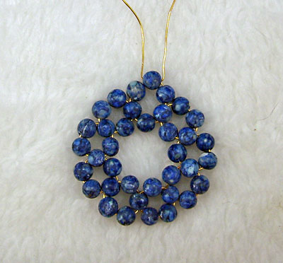 Earrings of round beads