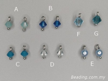 Earrings of blue faceted bicone