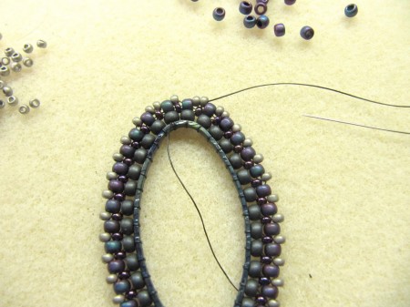 Oval beaded pendant