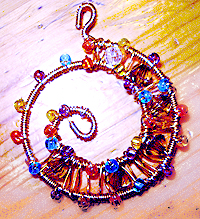 Spiral decoration from wire and beads