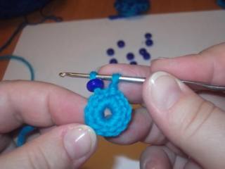 Hook and beads. Knit flower