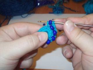 Hook and beads. Knit flower