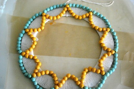 Summer wreath of wooden beads