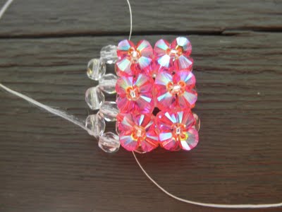 A ring of beads and bicone Swarovski