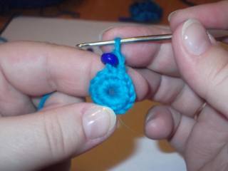 Hook and beads. Knit flower